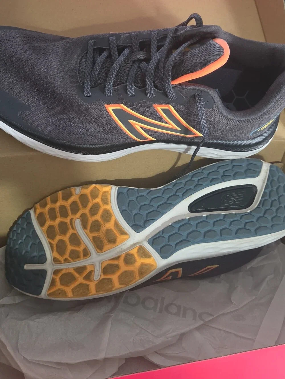 New Balance Black Athletic Shoes with Orange Trim